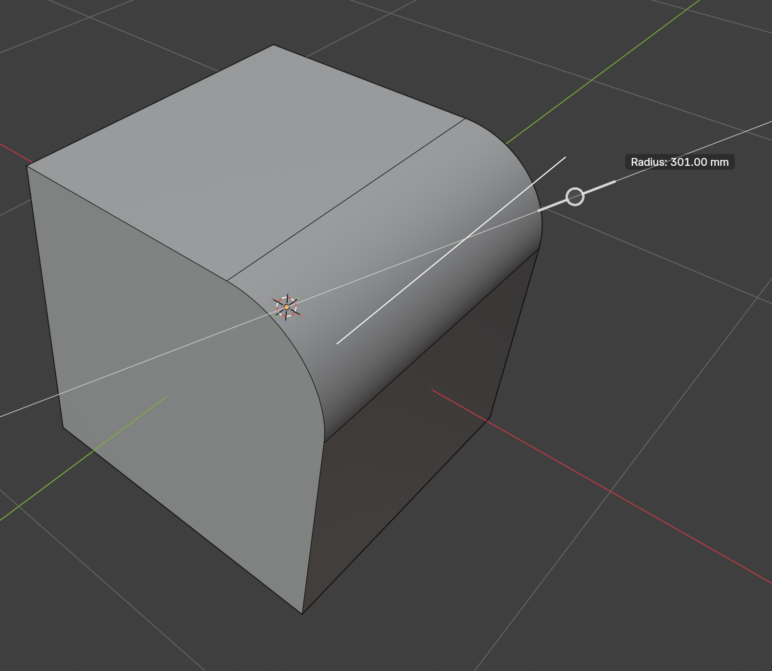 A cube with one edge rounded by a fillet, with the Radius: 301.00 mm label and drag handle